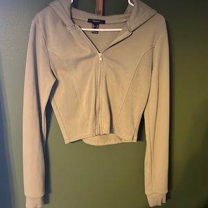 Army green cropped zip up.